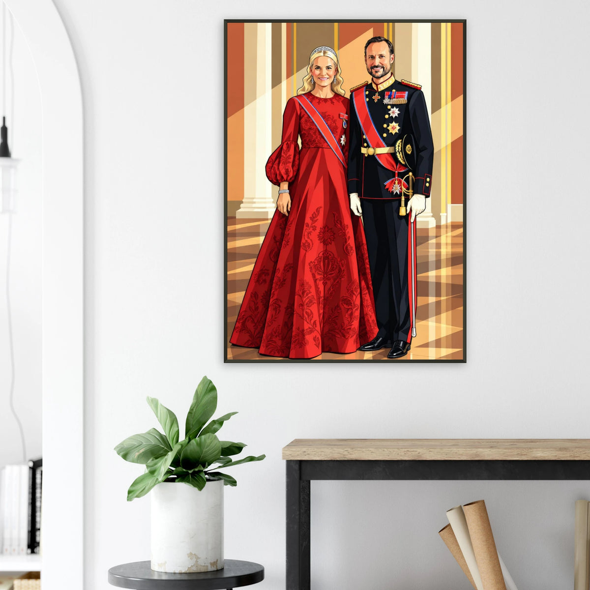 Kongelig eleganse veggkunst av Kongen og Dronningen i rødt og svart kostyme, med sort ramme.